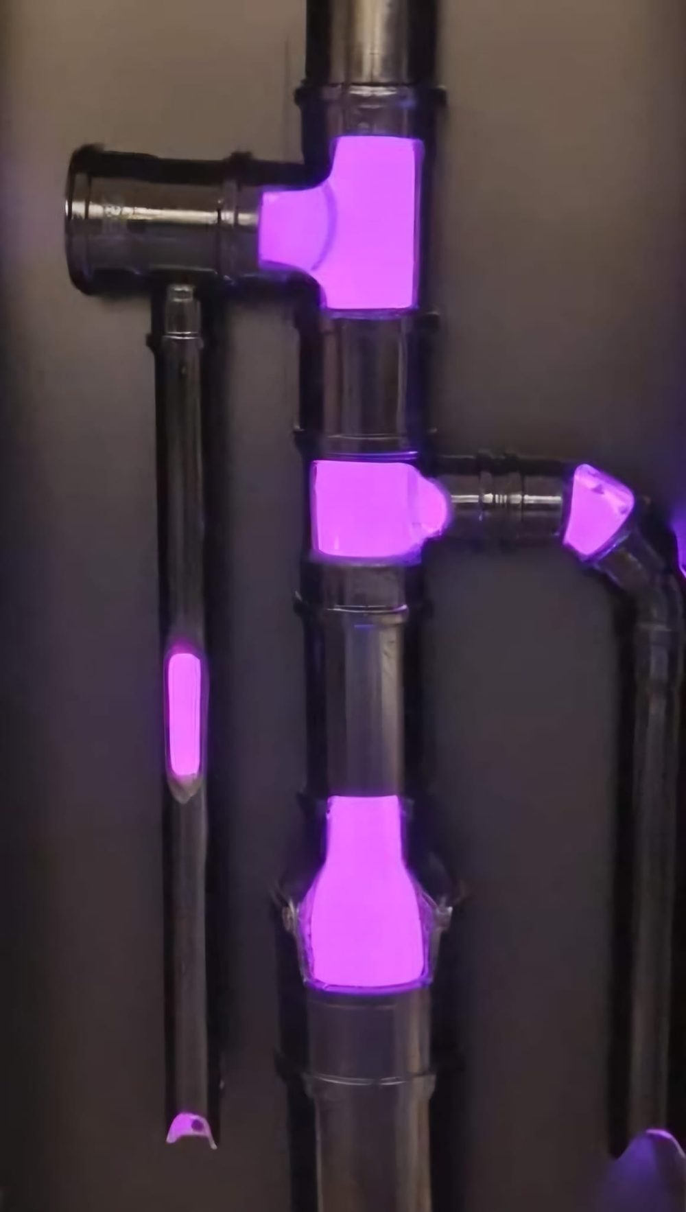 UV light curing a liner inside pipe fittings